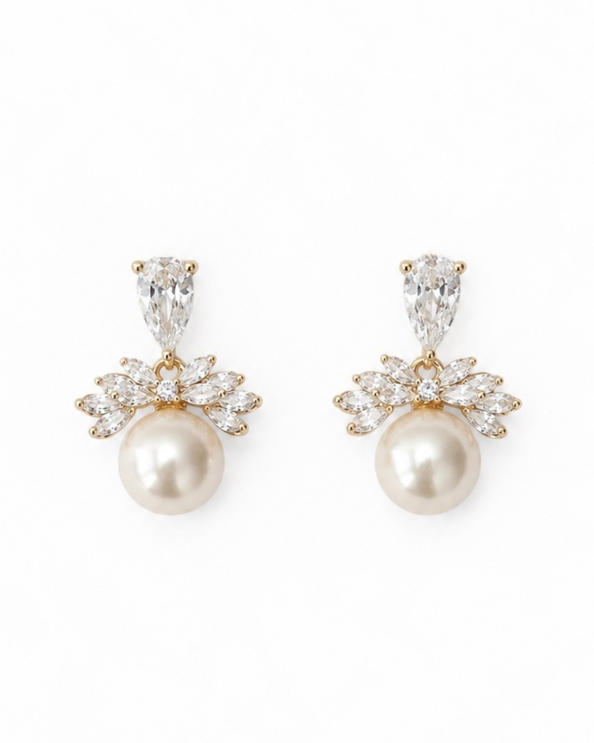 A pair of gold and pearl stud earrings with clear marquise and round crystals, shown on a plain white background.